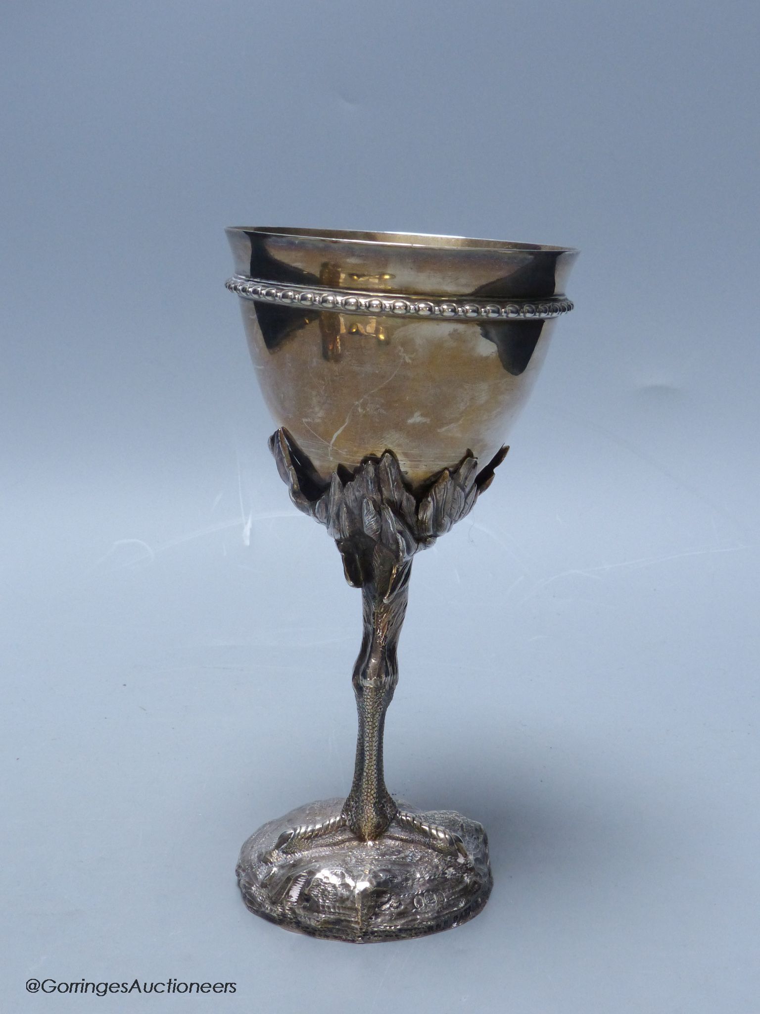 A Victorian silver goblet, the removable stem modelled as the leg of an ostrich, Robert Garrard II, London, 1859, 19.1cm, 10oz.